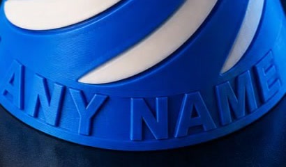 Close-up of embossed custom wording on a blue 3D-printed product
